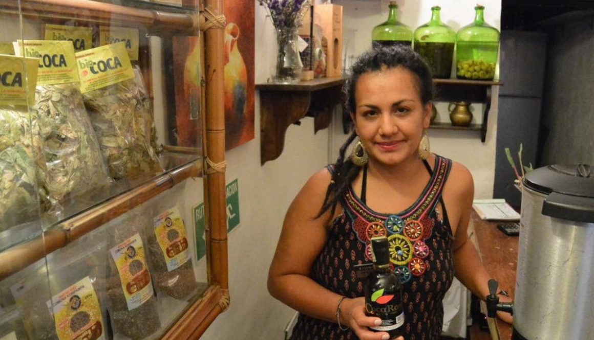 Ximena in the shop with some coca-infused rum